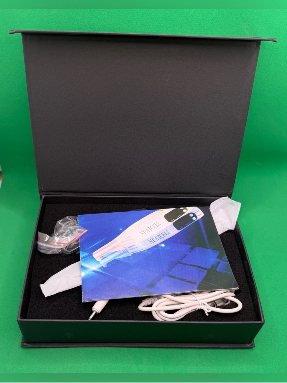 NEATECH White Handheld Device in White